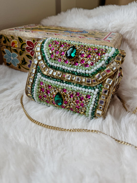 Peacock clutch